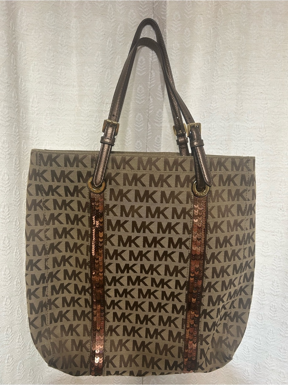 Michael Kors Brown MK Monogram Tote with leather handles and bronze sequins